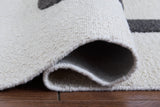 Davismour Ivory/Taupe/Charcoal Medium Rug by Ashley at Eve Furniture