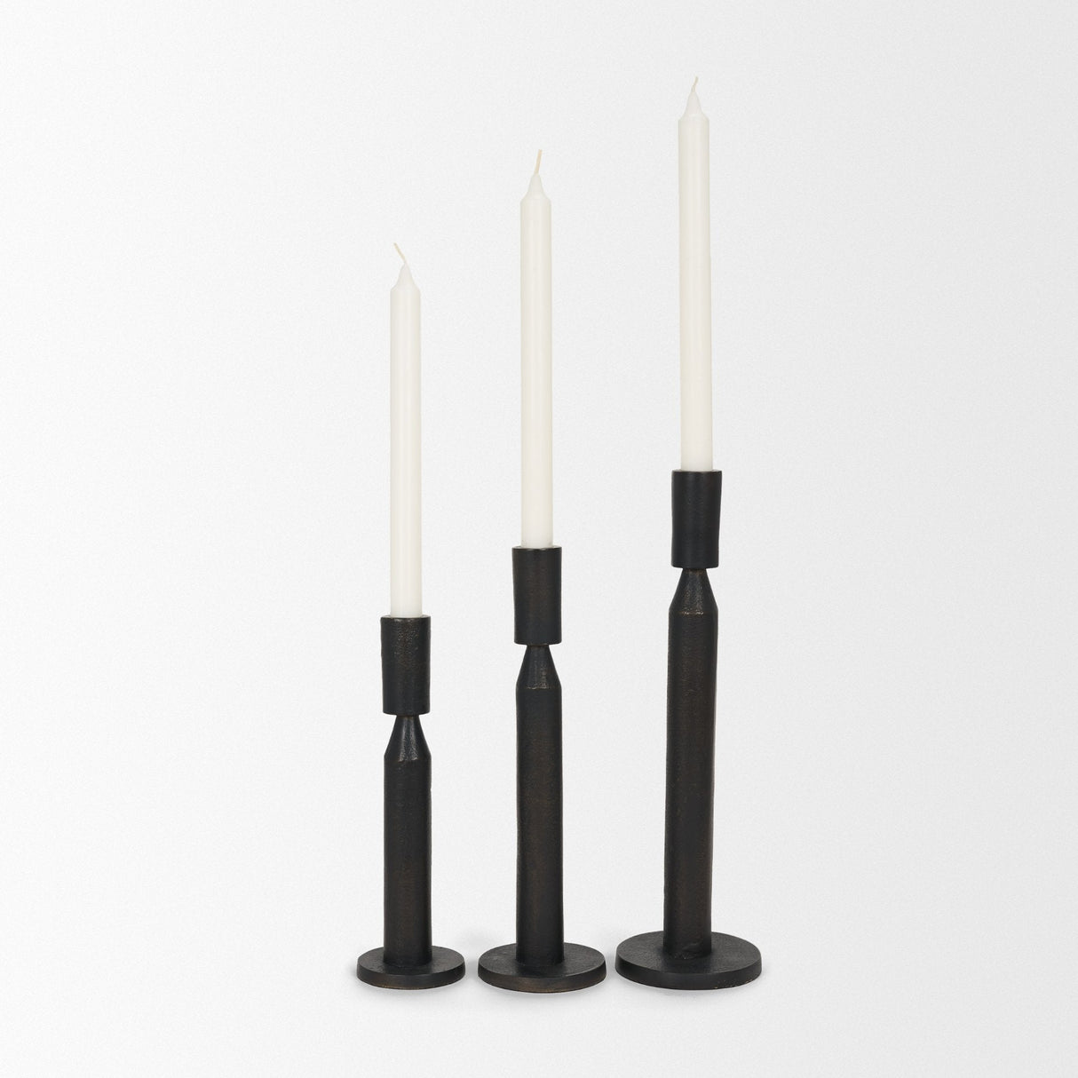 Declan Textured Matte Black Cast Metal Taper Candle Holder by Mercana at Eve Furniture
