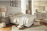 Dolante Beige King Upholstered Bed by Ashley at Eve Furniture