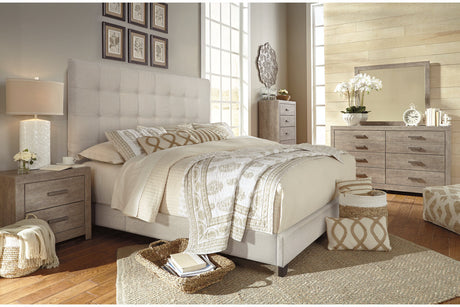 Dolante Beige Queen Upholstered Bed by Ashley at Eve Furniture