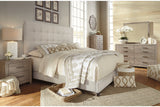 Dolante Beige Queen Upholstered Bed by ASHLEY FURNITURE at Eve Furniture
