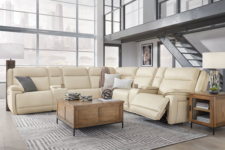 Double Deal Almond 7-Piece Power Reclining Sectional with Consoles by Ashley at Eve Furniture