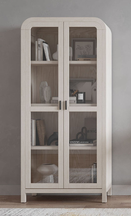 Drake Glass Door Wooden Bookcase in Sugar by Modus Furniture at Eve Furniture