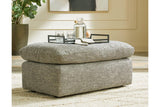 Dramatic Granite Ottoman by Ashley at Eve Furniture