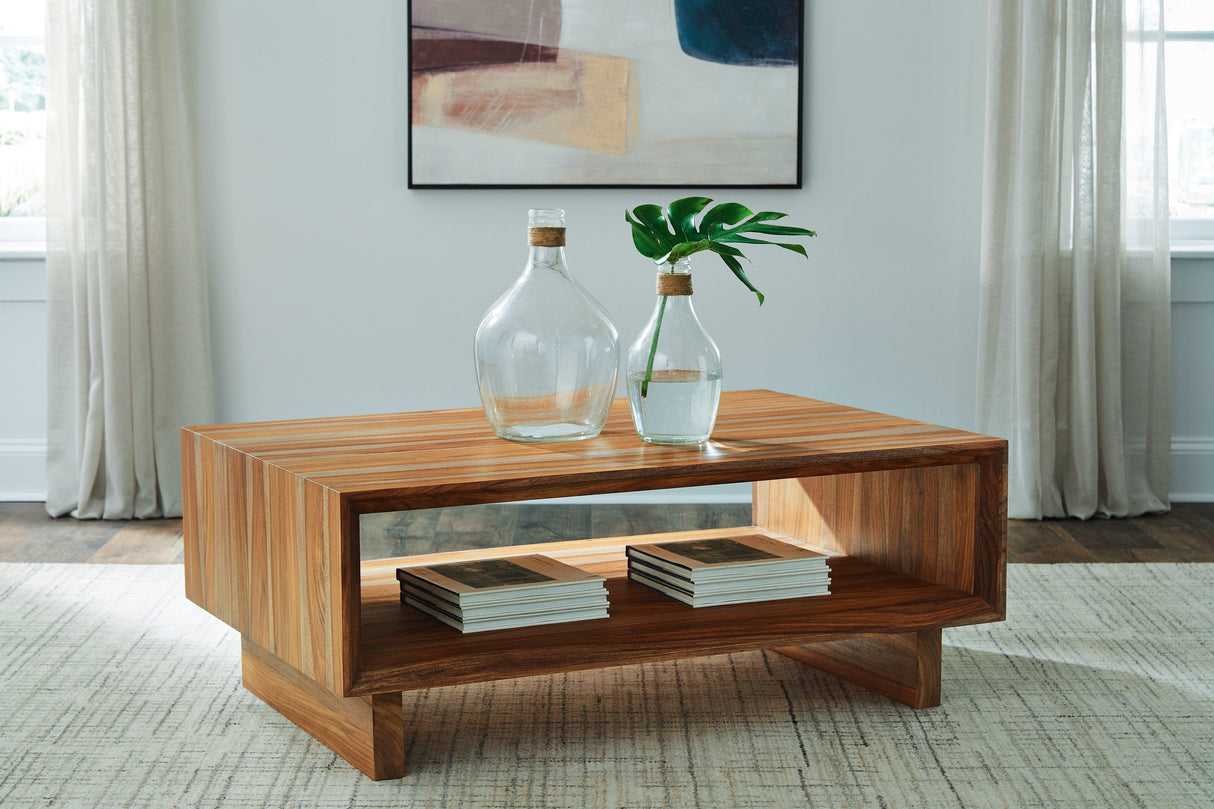 Dressonni Brown Coffee Table by Ashley at Eve Furniture