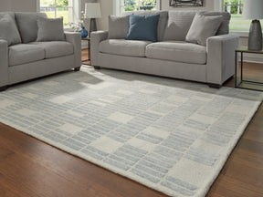 Dylanton Ivory/Blue Large Rug by Ashley at Eve Furniture