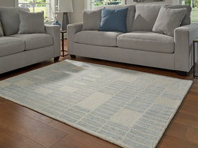 Dylanton Ivory/Blue Medium Rug by Ashley at Eve Furniture