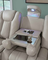 Elevate Edges Coin Reclining Sofa with Drop Down Table by Ashley at Eve Furniture