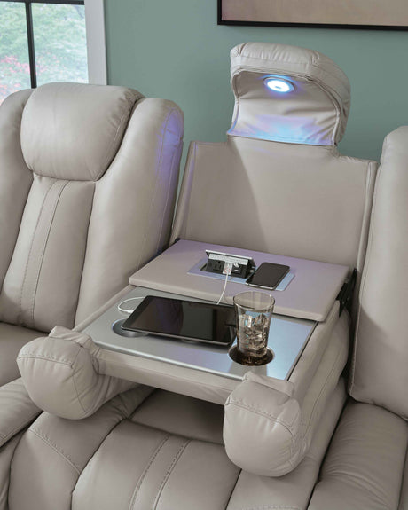Elevate Edges Coin Reclining Sofa with Drop Down Table by Ashley at Eve Furniture