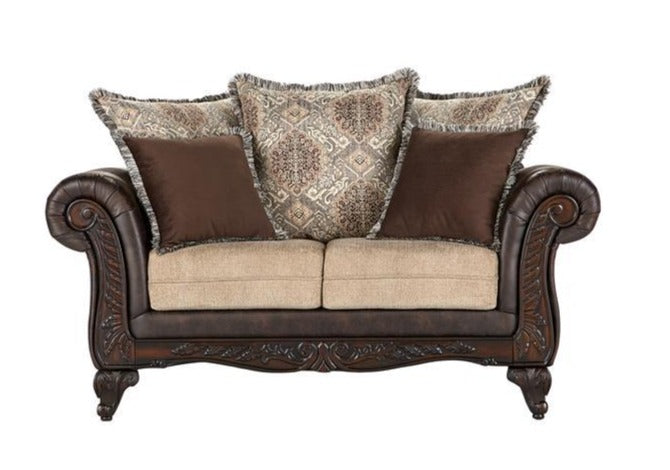 Elmbrook Upholstered Rolled Arm Loveseat with Intricate Wood Carvings Brown