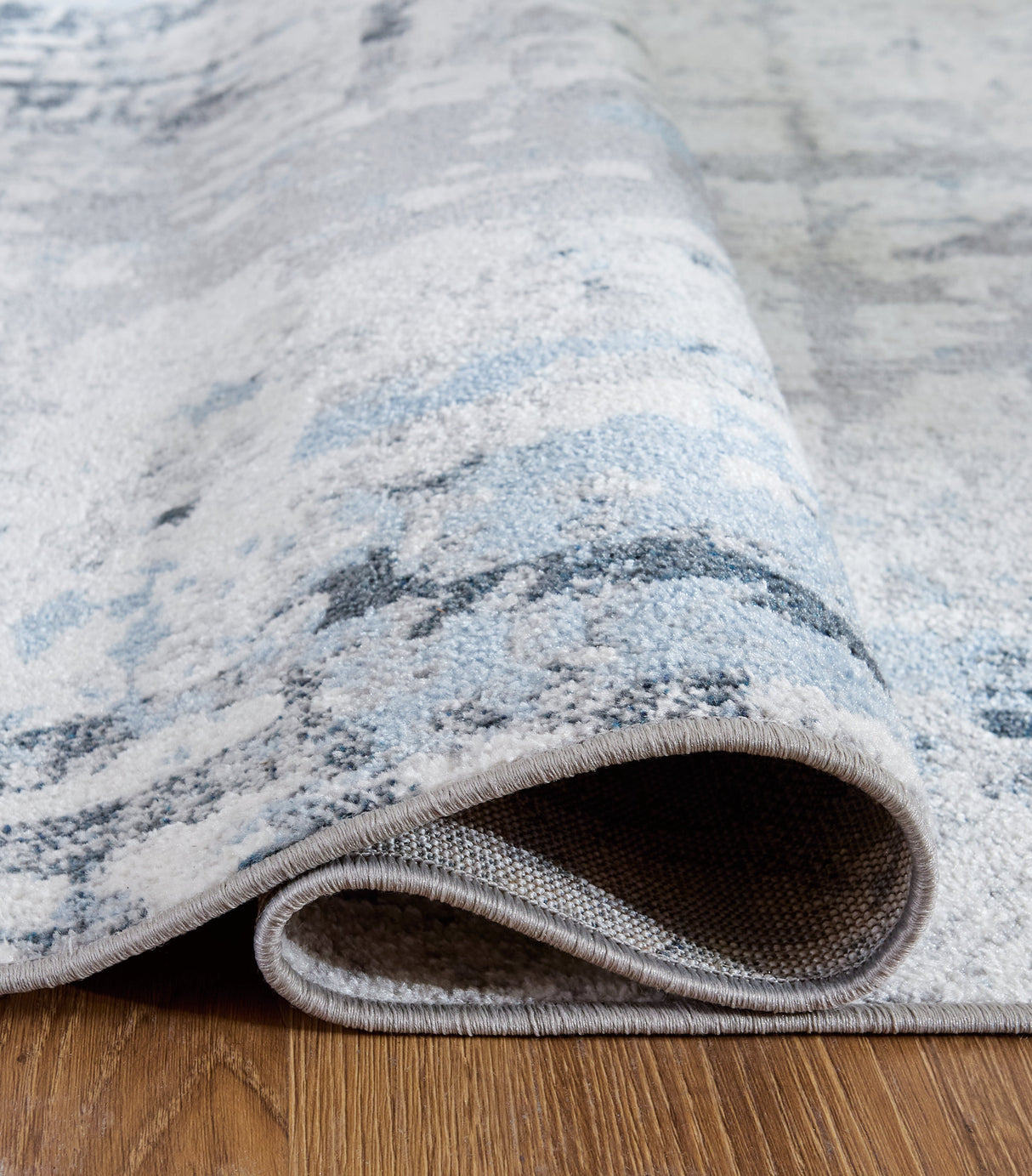 Emertonly Blue/White/Gray Medium Rug by ASHLEY FURNITURE at Eve Furniture