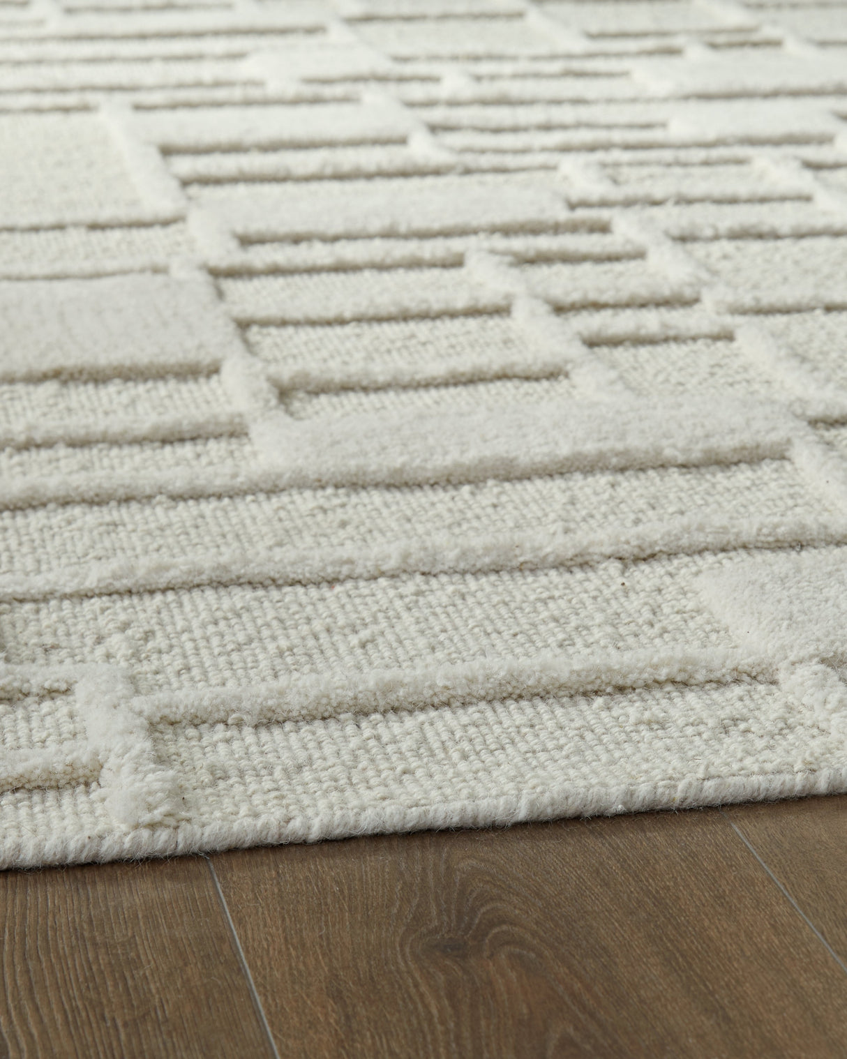 Empriss Ivory Large Rug by Ashley at Eve Furniture