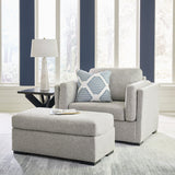 Evansley Chair and Ottoman in Pewter by Ashley at Eve Furniture