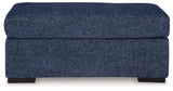 Evansley Navy Ottoman by Ashley at Eve Furniture