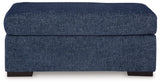 Evansley Navy Ottoman by Ashley at Eve Furniture