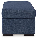 Evansley Navy Ottoman by Ashley at Eve Furniture