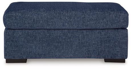Evansley Navy Ottoman by Ashley at Eve Furniture