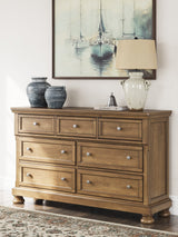 Feddinger Medium Brown Sleigh Panel Bedroom Set by Ashley at Eve Furniture
