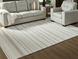 Gadence Ivory/Tan Large Rug by Ashley at Eve Furniture
