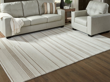 Gadence Ivory/Tan Large Rug by Ashley at Eve Furniture