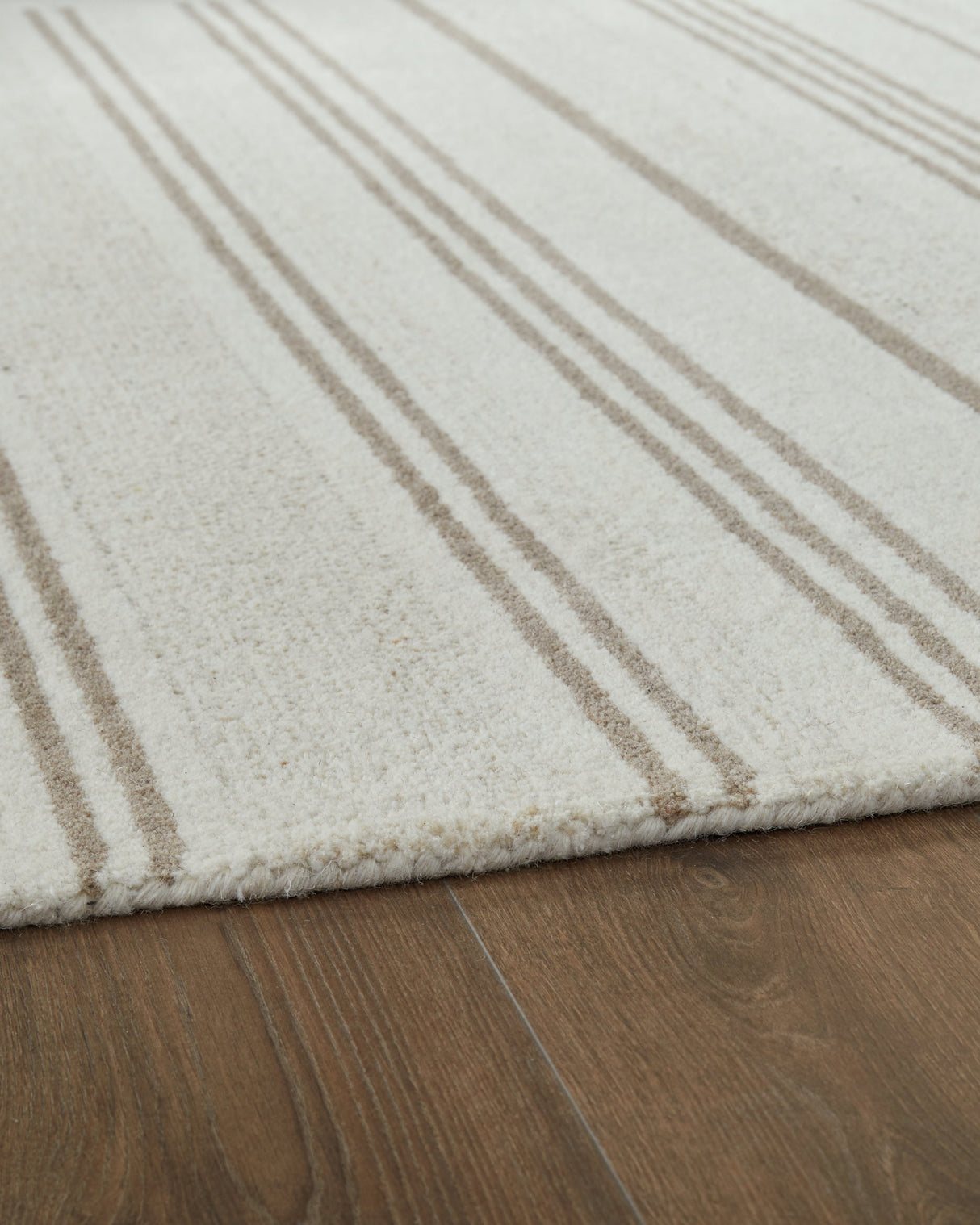 Gadence Ivory/Tan Medium Rug by Ashley at Eve Furniture