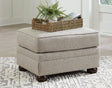 Gaelon Dune Ottoman by Ashley at Eve Furniture