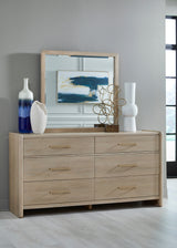 Gardenia Beveled Glass Wall or Dresser Mirror in Chai by Modus Furniture at Eve Furniture