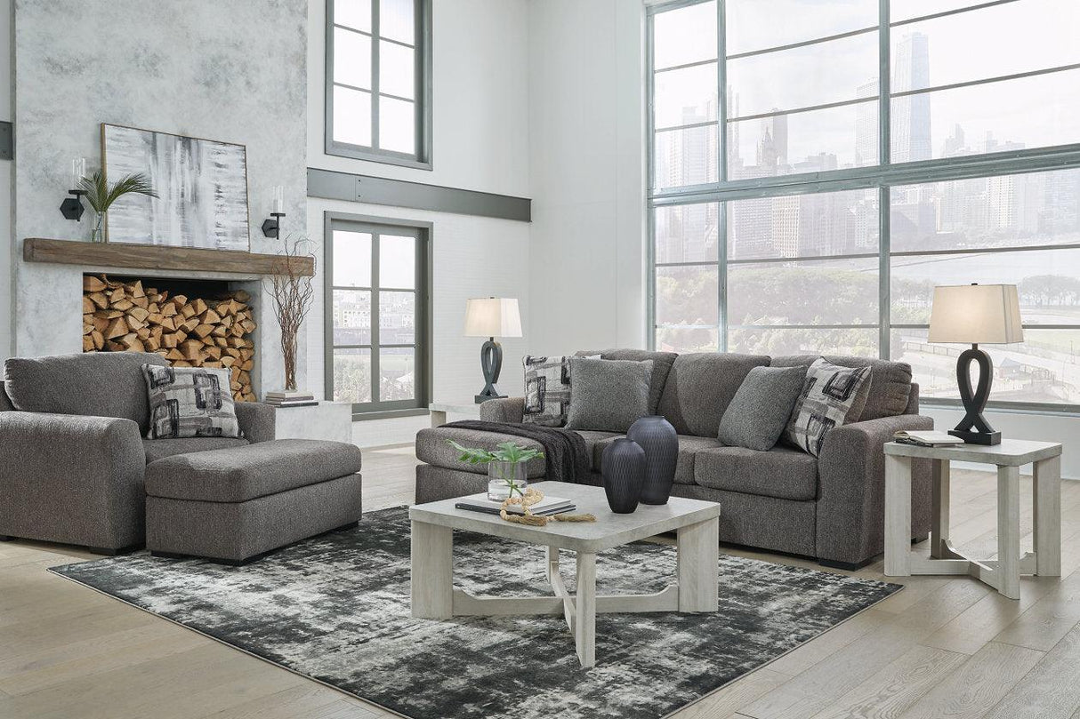 Gardiner Pewter Sofa Chaise and Ottoman by Ashley at Eve Furniture
