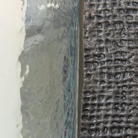 Garekton Clear/Pewter Finish Candle Holder by Ashley at Eve Furniture