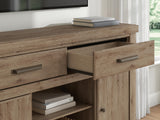 Garistyn Brown 62" TV Stand by Ashley at Eve Furniture