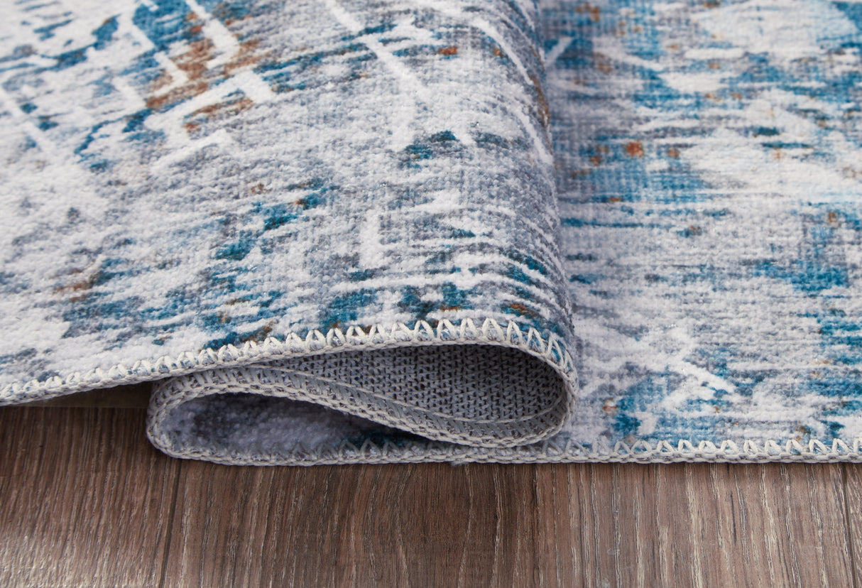 Garyard Multi 5' x 7' Rug by ASHLEY FURNITURE at Eve Furniture