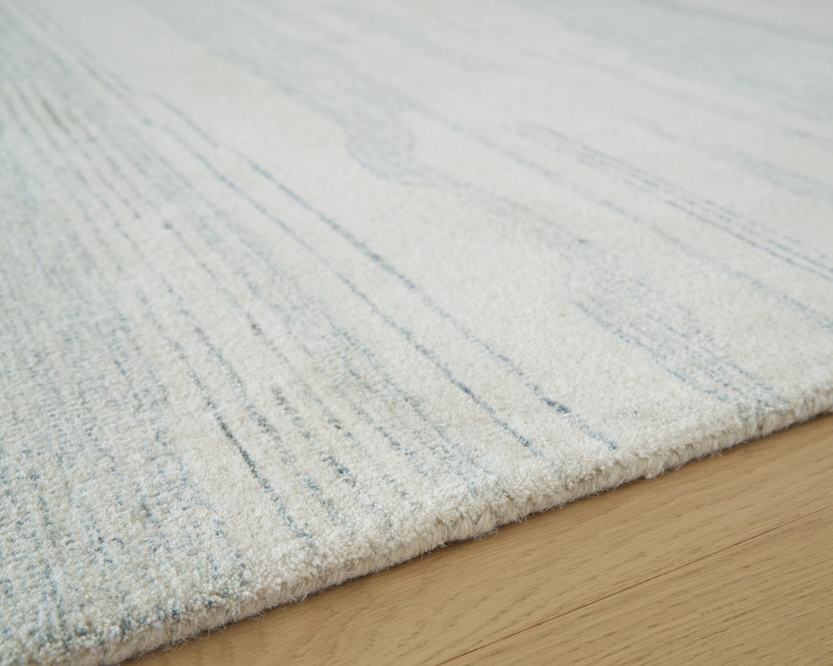 Genemost Ivory/Blue Large Rug by ASHLEY FURNITURE at Eve Furniture