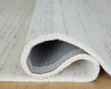 Genemost Ivory/Blue Large Rug by ASHLEY FURNITURE at Eve Furniture