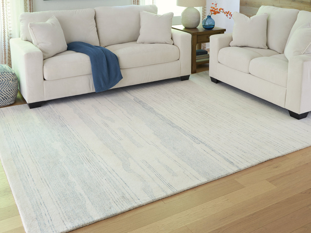 Genemost Ivory/Blue Large Rug by ASHLEY FURNITURE at Eve Furniture