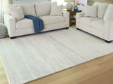 Genemost Ivory/Blue Large Rug by ASHLEY FURNITURE at Eve Furniture