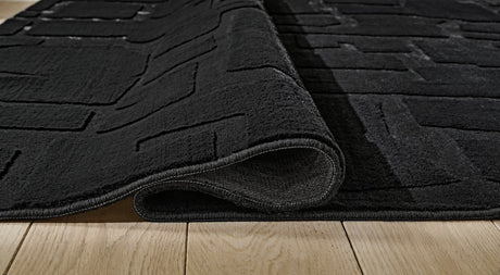 Gibbswell Black Washable Medium Rug by Ashley at Eve Furniture
