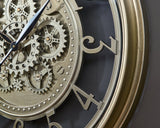 Gilover Champagne Finish Wall Clock by Ashley at Eve Furniture