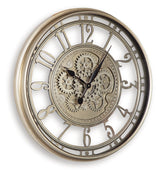 Gilover Champagne Finish Wall Clock by Ashley at Eve Furniture