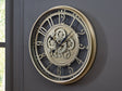 Gilover Champagne Finish Wall Clock by Ashley at Eve Furniture
