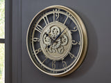 Gilover Champagne Finish Wall Clock by Ashley at Eve Furniture