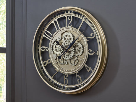Gilover Champagne Finish Wall Clock by Ashley at Eve Furniture