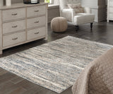 Gizela Ivory/Beige/Gray Large Rug by Ashley at Eve Furniture