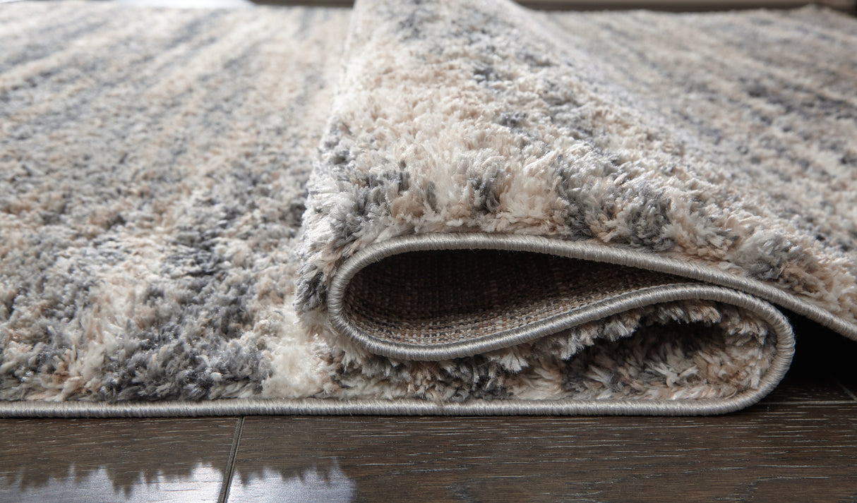 Gizela Ivory/Beige/Gray Large Rug by Ashley at Eve Furniture