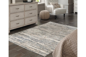 Gizela Ivory/Beige/Gray Large Rug by Ashley at Eve Furniture