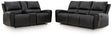 Glossmore Black Reclining Sofa and Loveseat by Ashley at Eve Furniture
