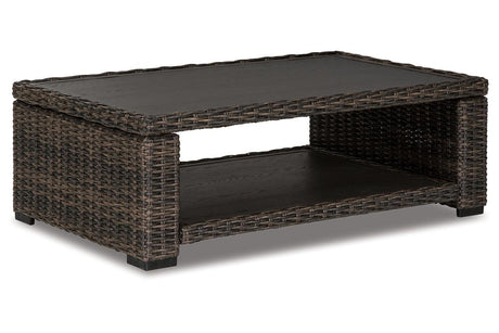 Grasson Lane Brown Coffee Table by Ashley at Eve Furniture