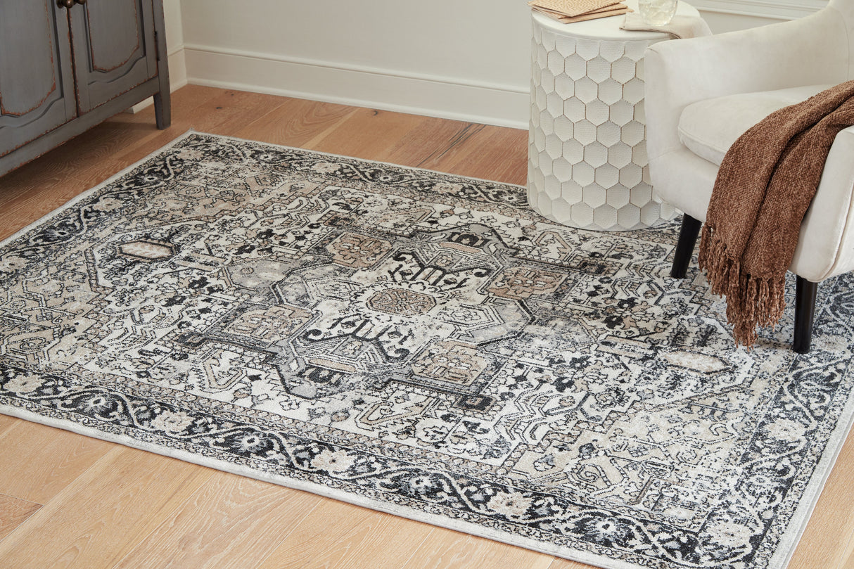 Gregmoore Multi 5'2" x 6'10" Rug by ASHLEY FURNITURE at Eve Furniture