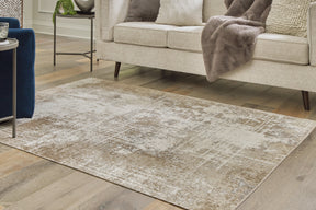Grifflain Tan/Brown/Gray Medium Rug by Ashley at Eve Furniture