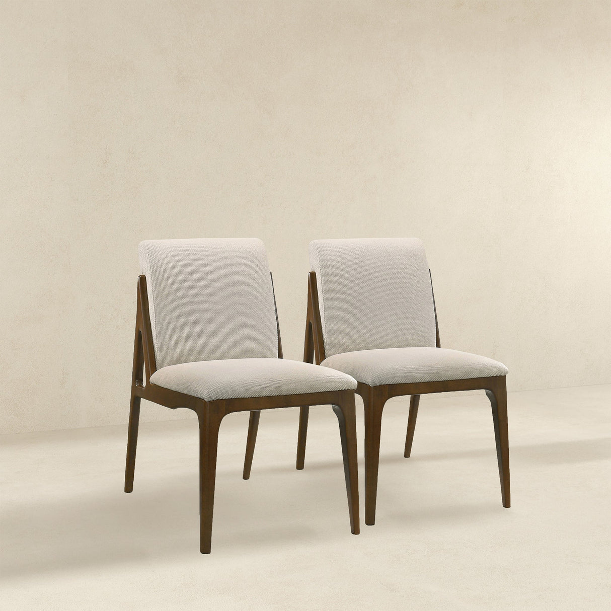 Grivelle Cream Fabric Dining Chair (Set Of 2) by Ashcroft Imports at Eve Furniture