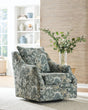 Gubbins Blue/Green/Yellow Swivel Accent Chair by Ashley at Eve Furniture